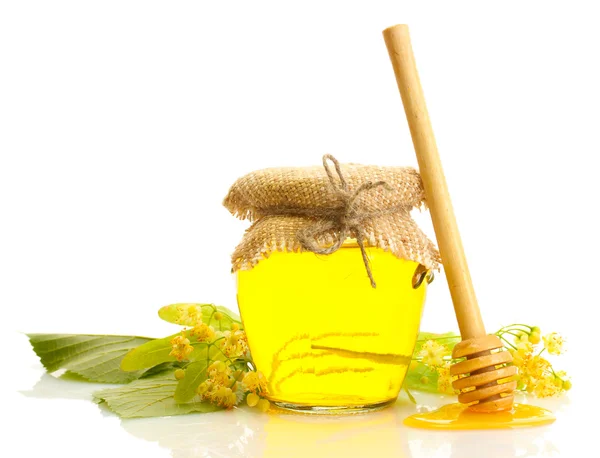 Jar met linden honing en bloemen geïsoleerd op wit — Stockfoto