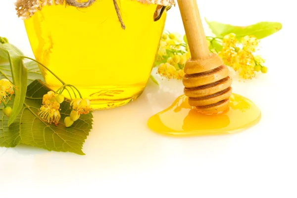 JAR s linden med a květiny izolovaných na bílém — Stock fotografie