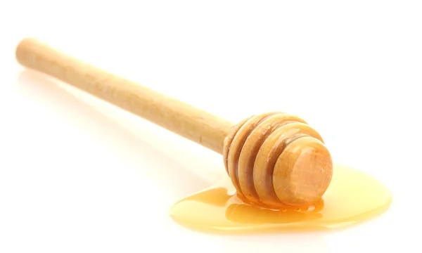 Drizzler met zoete honing geïsoleerd op wit — Stockfoto
