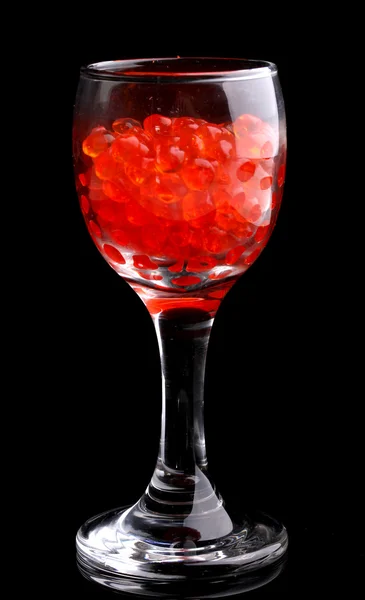Red caviar in glass isolated on black — Stock Photo, Image