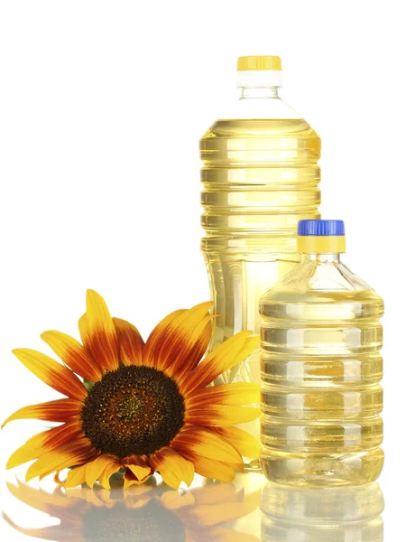 Sonnenblumenöl und Sonnenblumen isoliert auf weiß — Stockfoto