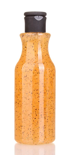 Bottiglia con scrub isolato su bianco — Foto Stock