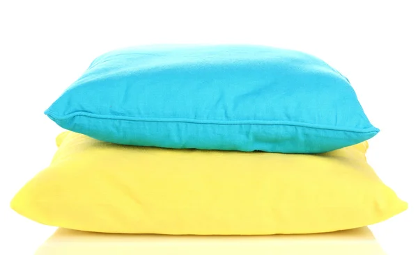 Almohadas de color brillante aisladas en blanco — Foto de Stock