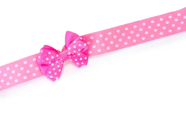 Beautiful pink bow and ribbon isolated on white Royalty Free Stock Images