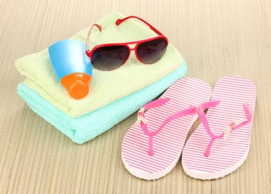 Beach accessories on mat