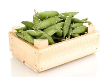 Green peas in crate isolated on white clipart