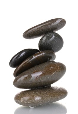 Stack of balanced stones isolated on white clipart