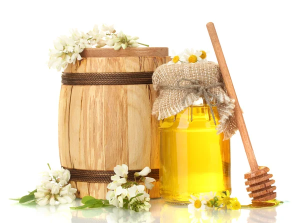 Sweet honey in barrel and jar with acacia flowers isolated on white — Stock Photo, Image