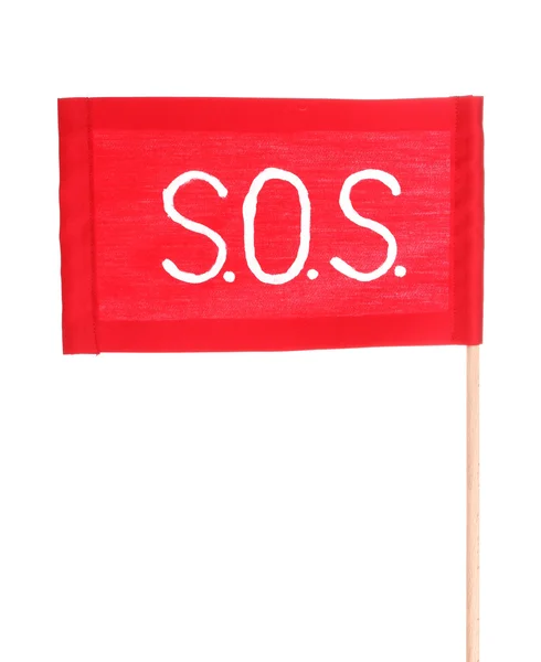 Sos 信号隔离在白纸上的红布上写的 — 图库照片