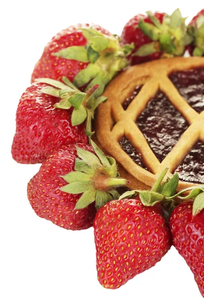 Tart garnished with strawberry on white background close-up — Stock Photo, Image