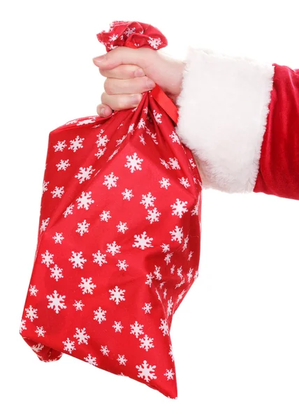 Noel Baba el çantası hediye üzerinde beyaz izole tutarak — Stok fotoğraf