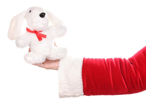 Santa Claus mano celebración juguete conejo aislado en blanco — Foto de Stock