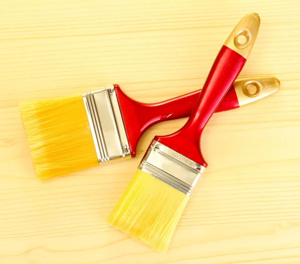 Ahşap arkaplanda boya fırçaları — Stok fotoğraf