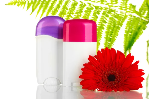 Deodorants with flower and green leaf isolated on white — Stock Photo, Image