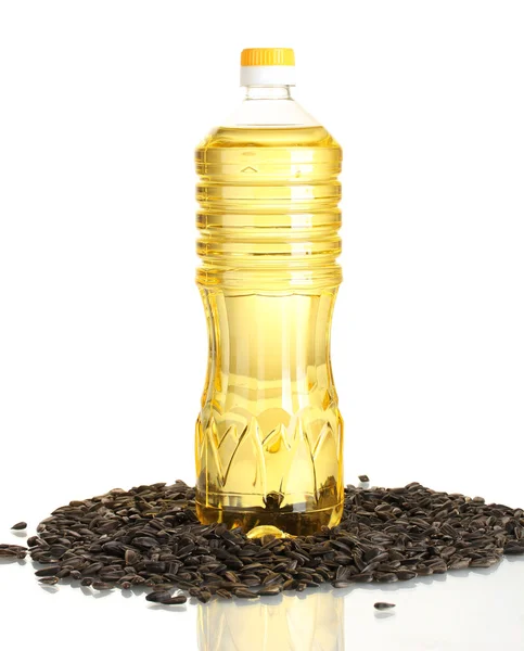 Соняшникова олія з насінням соняшнику ізольовані на білому тлі — стокове фото