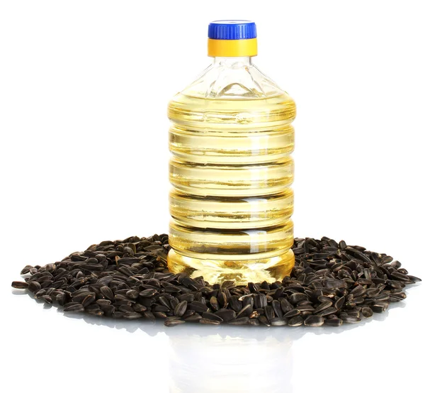 Sunflower oil with sunflower seeds isolated on white background — Stock Photo, Image