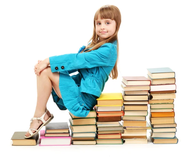 Holčička s knihami, izolované na bílém — Stock fotografie