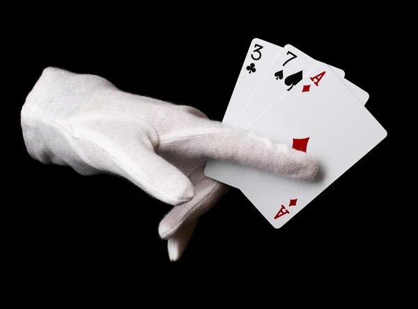Cards in hand isolated on black — Stock Photo, Image