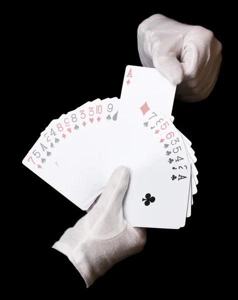 Cartões em mãos isoladas em preto — Fotografia de Stock