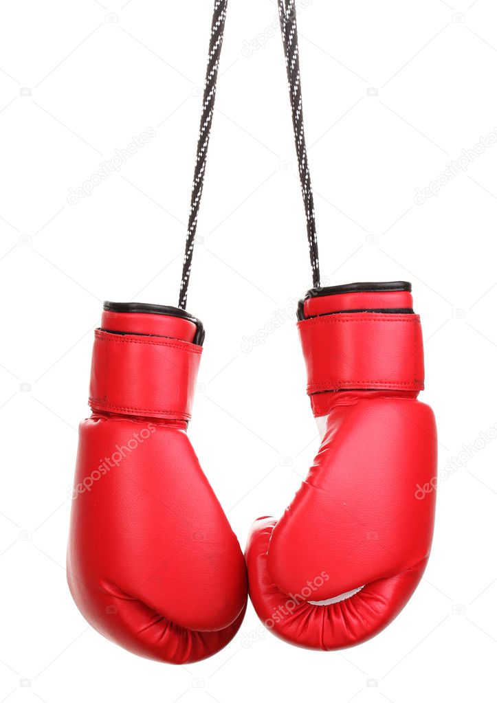 Red boxing gloves hanging isolated on white