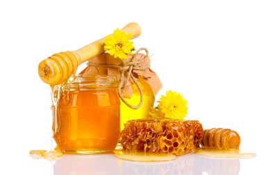 Two jars of honey, honeycombs and wooden drizzler isolated on white clipart