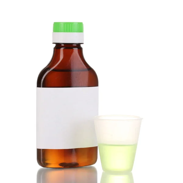 Bottiglia medica e jigger isolati su bianco — Foto Stock