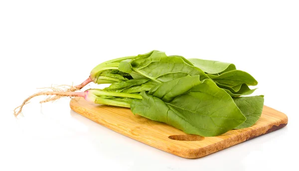 Fresh spinach on wooden board isolated on white — Stock Photo, Image