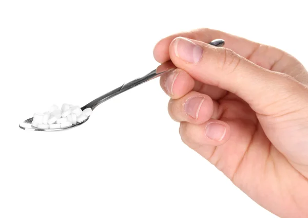 Γλυκαντική ουσία σε μεταλλικό κουτάλι που απομονώνονται σε λευκό — Φωτογραφία Αρχείου