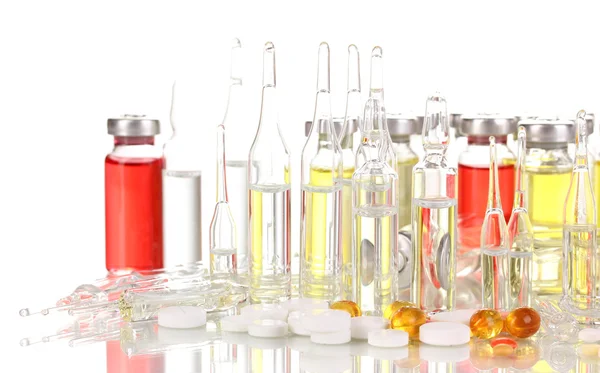 Tablets and ampoules isolated on white — Stock Photo, Image