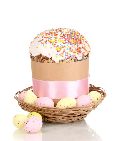 Beautiful Easter cake in basket with eggs isolated on white — Stock Photo, Image