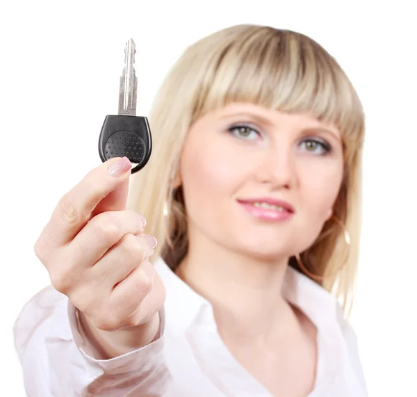 Młoda kobieta z kluczyki do samochodu na białym tle — Zdjęcie stockowe