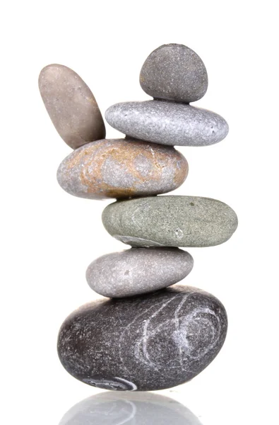 Stack of balanced stones isolated on white Stock Image