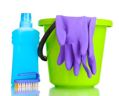 Detergent and bucket with gloves isolated on white clipart