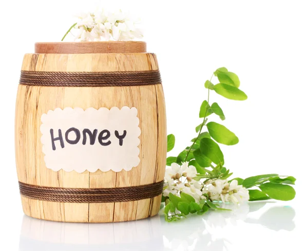 Miel sucré en barrique avec des fleurs d'acacia isolées sur blanc — Photo