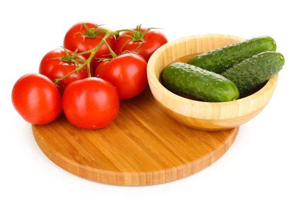 Tomatoes and cucumbers isolated on white — Stock Photo, Image