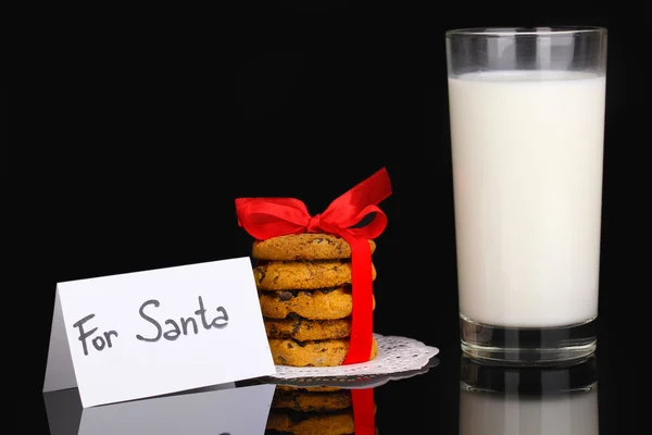 Glass of milk and cookies isolated on black — Stock Photo, Image