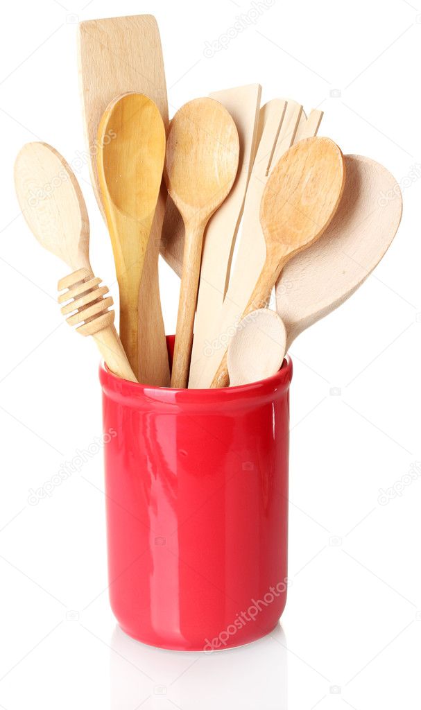 Wooden kitchen utensils in cup isolated on white