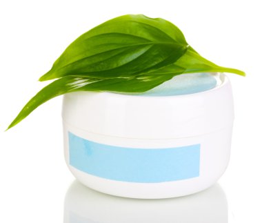 Jar of cream with green leaves isolated on white clipart