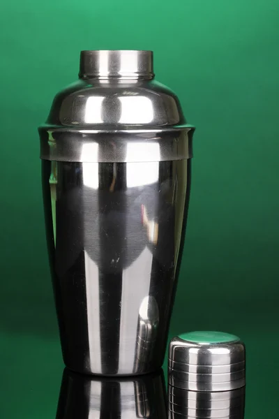 Cocktail shaker on green background — Stock Photo, Image