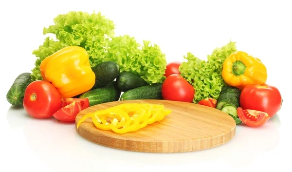Fresh vegetables on cutting board isolated on white — Stock Photo, Image