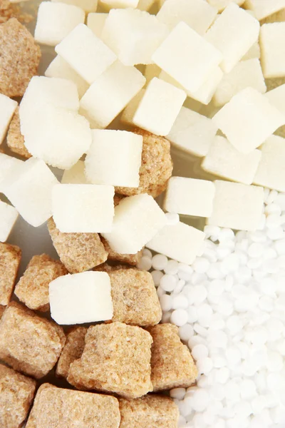 Edulcorante con azúcar blanca y morena de cerca —  Fotos de Stock