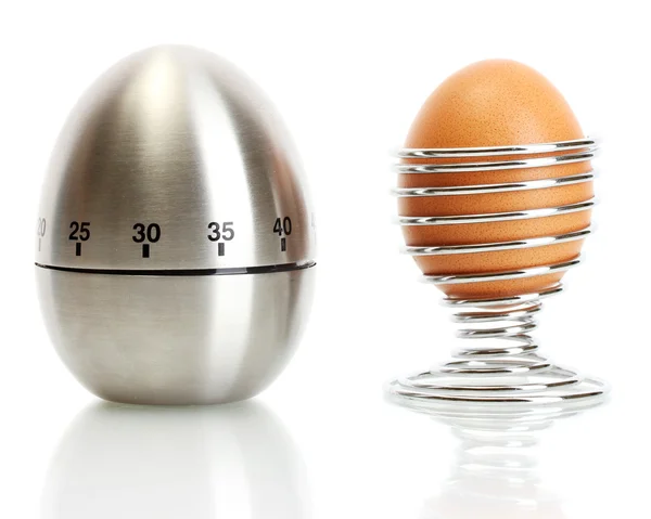 Zegar jaj oraz jaj w metalowy stojak na białym tle — Zdjęcie stockowe