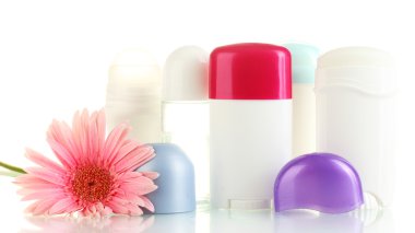 Deodorant and flower isolated on white clipart