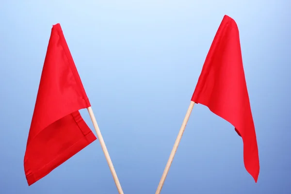Røde signalflag på blå baggrund - Stock-foto