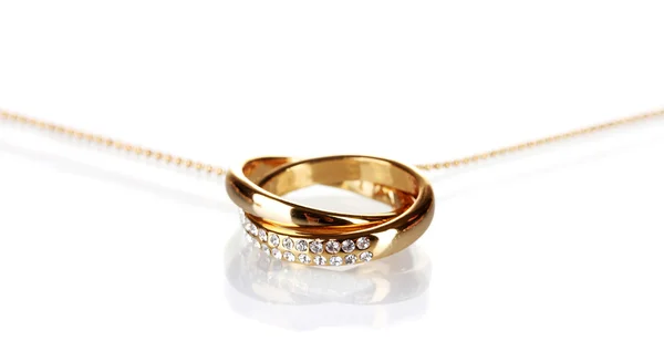 Pendentif en forme d'anneaux avec gemme isolé sur blanc — Photo