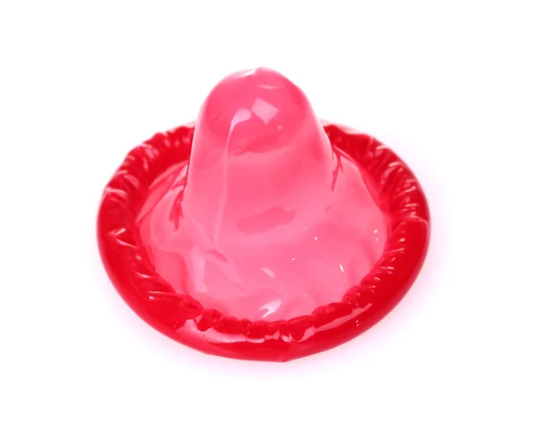 Red condom isolated on white — Stock Photo, Image