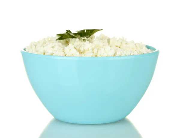 Cottage cheese with parsley in blue bowl isolated on white — Stock Photo, Image