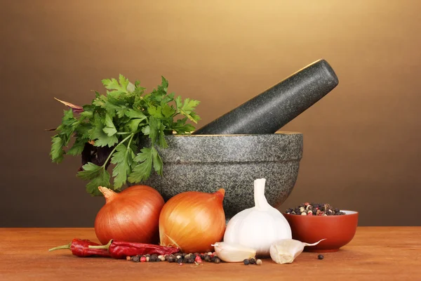 Set of ingredients and spice for cooking on wooden table on brown background — Stock Photo, Image