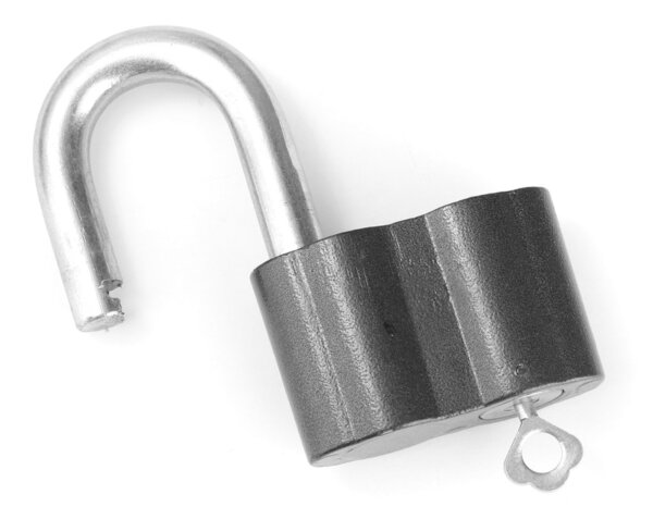 Old padlock with key isolated on white background