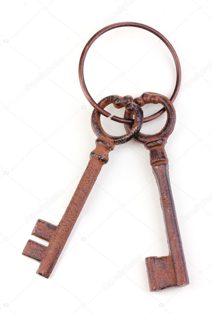 A bunch of antique keys isolated on white Stock Photo by ©belchonock  11552413